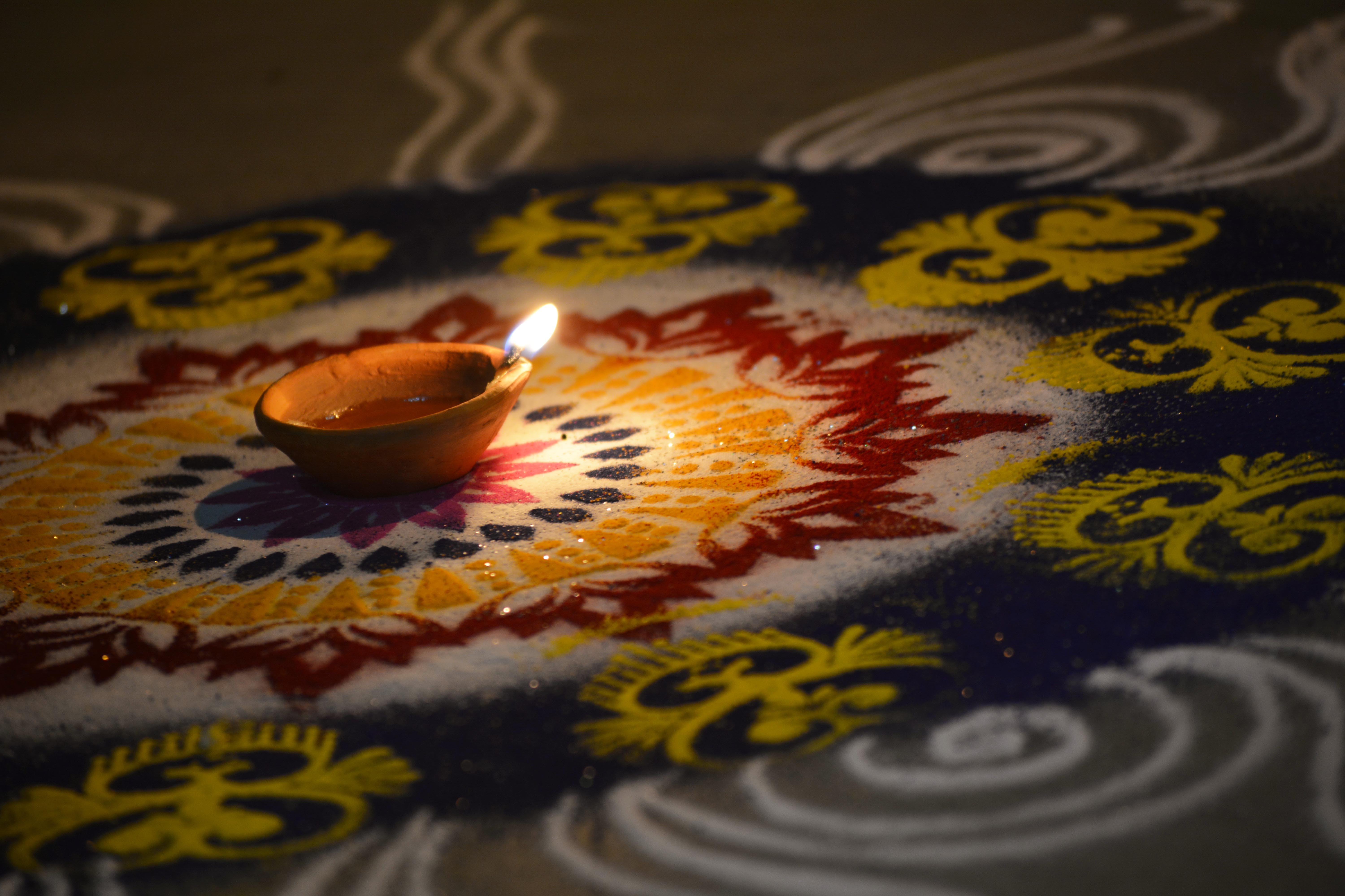 diwali wallpaper,yellow,diwali,textile,tablecloth,font