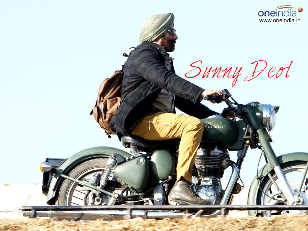 sunny deol wallpaper,vehicle,motorcycle,mode of transport,motorcycle accessories,sitting