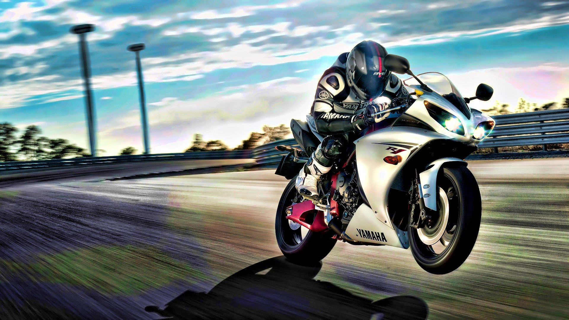 moto wallpapers,motorcycle racer,motorcycle,superbike racing,motorcycling,vehicle