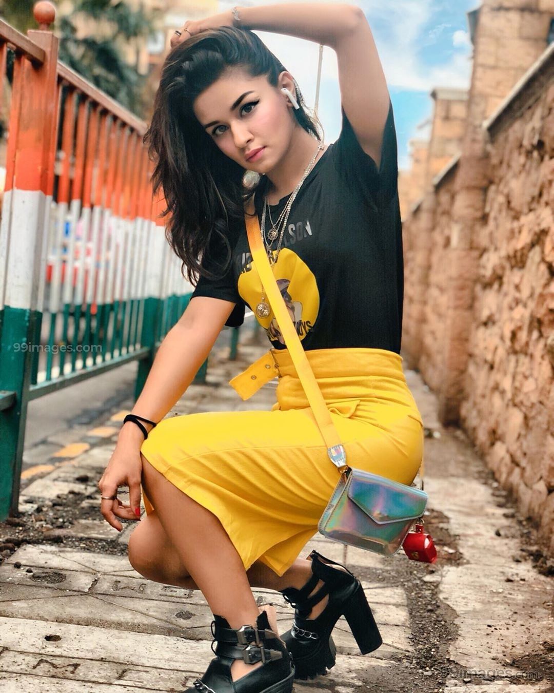 beautiful girl hd wallpapers for mobile,baseball bat,yellow,leg,photo shoot,footwear