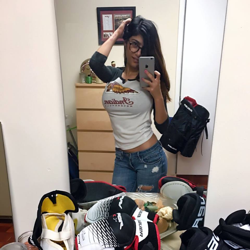 mia khalifa hd wallpaper,footwear,fun,headgear,personal protective equipment,room