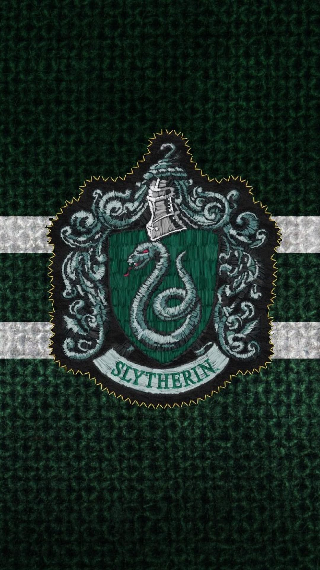 slytherin tapete,grün,emblem,muster,kopfbedeckung,jersey