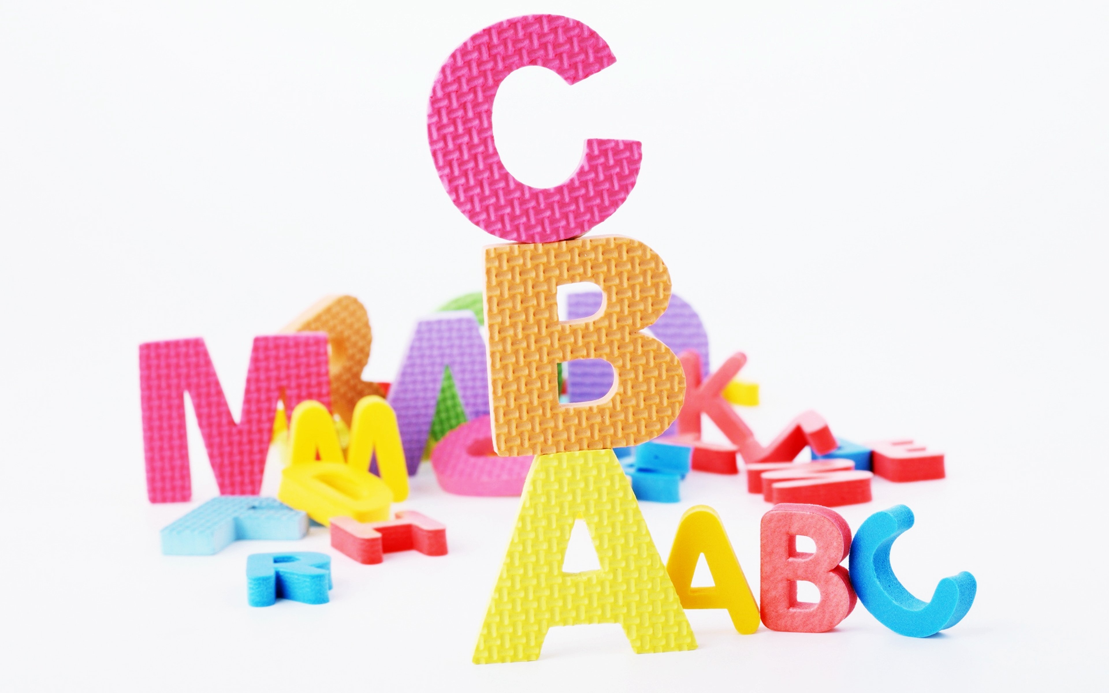 a alphabet wallpaper,product,text,font,toy,graphics