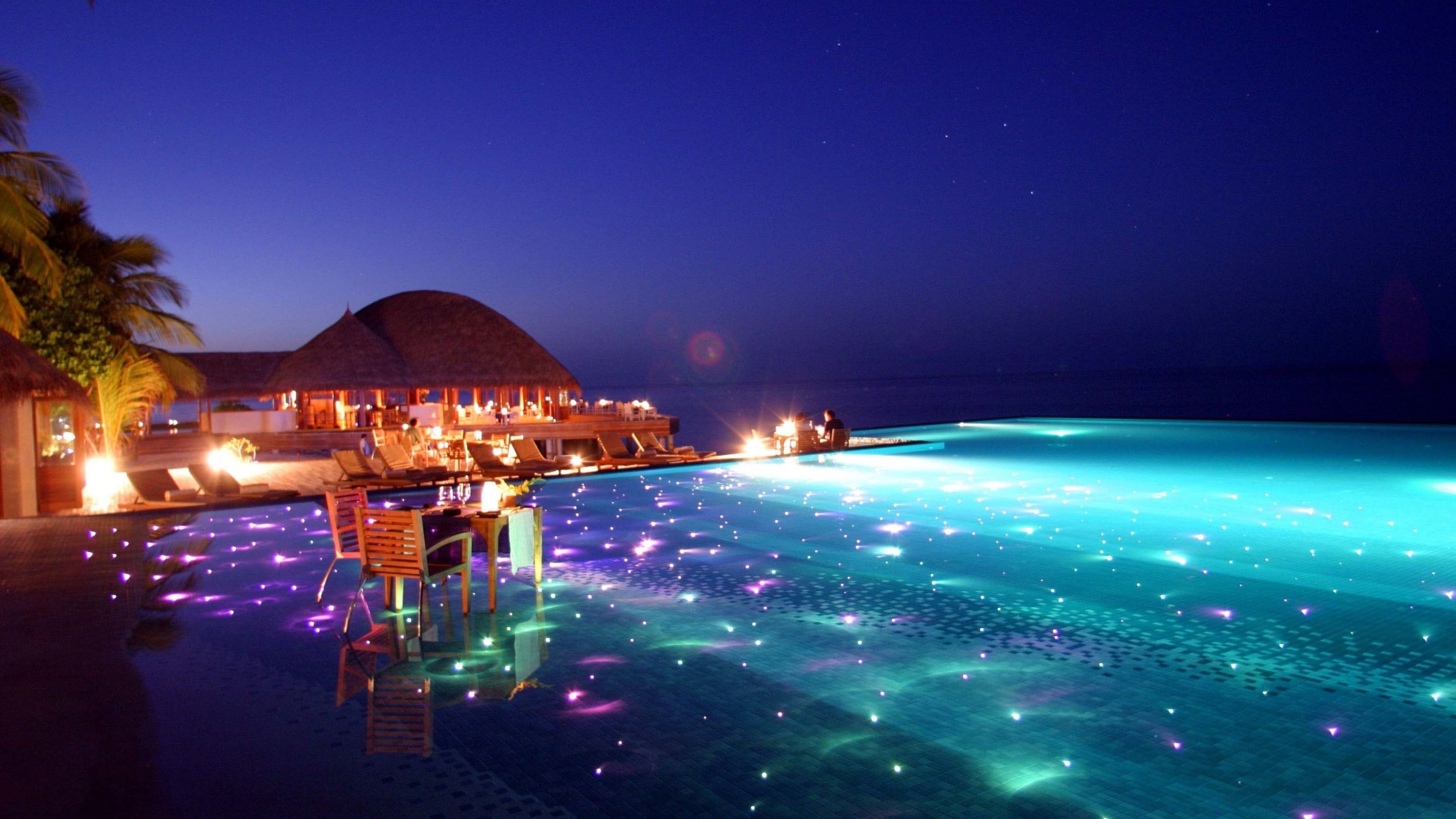 place wallpaper,resort,night,sky,swimming pool,lighting