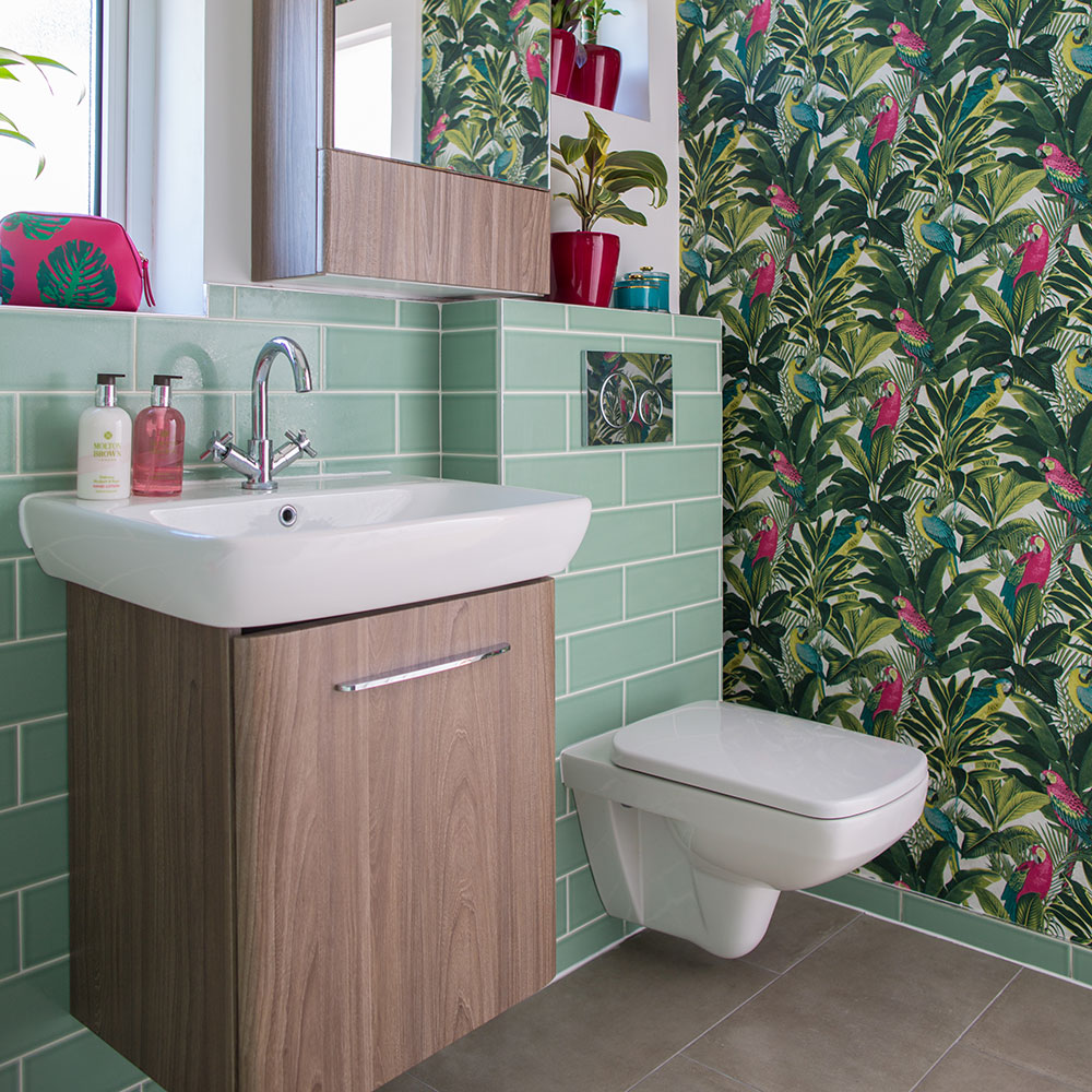 toilet wallpaper,bathroom,room,sink,tile,property