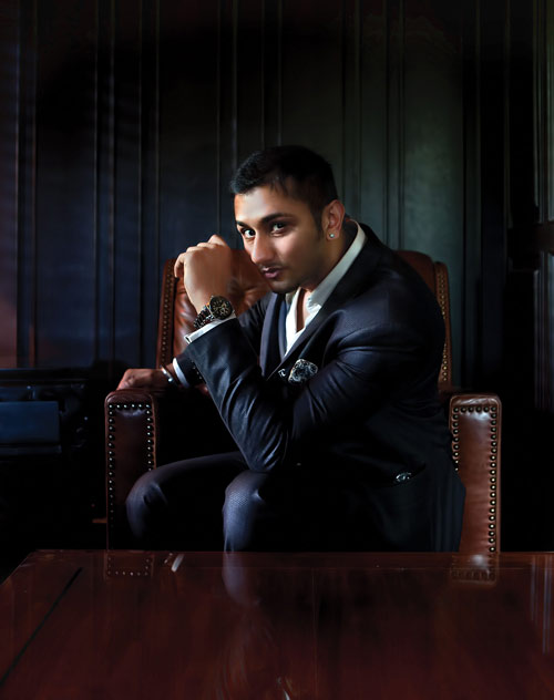 honey singh wallpaper,suit,formal wear,sitting,photography,muscle