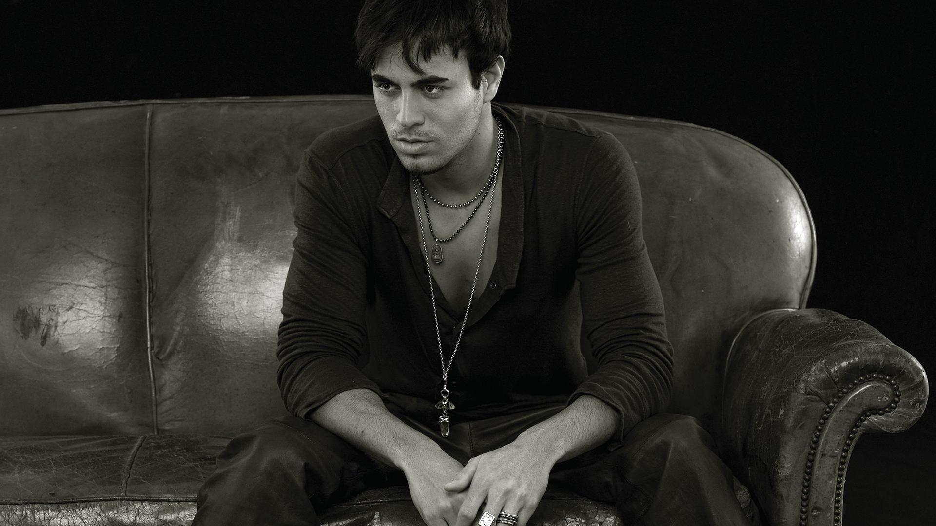 enrique iglesias hd wallpaper,photograph,sitting,human,photography,darkness