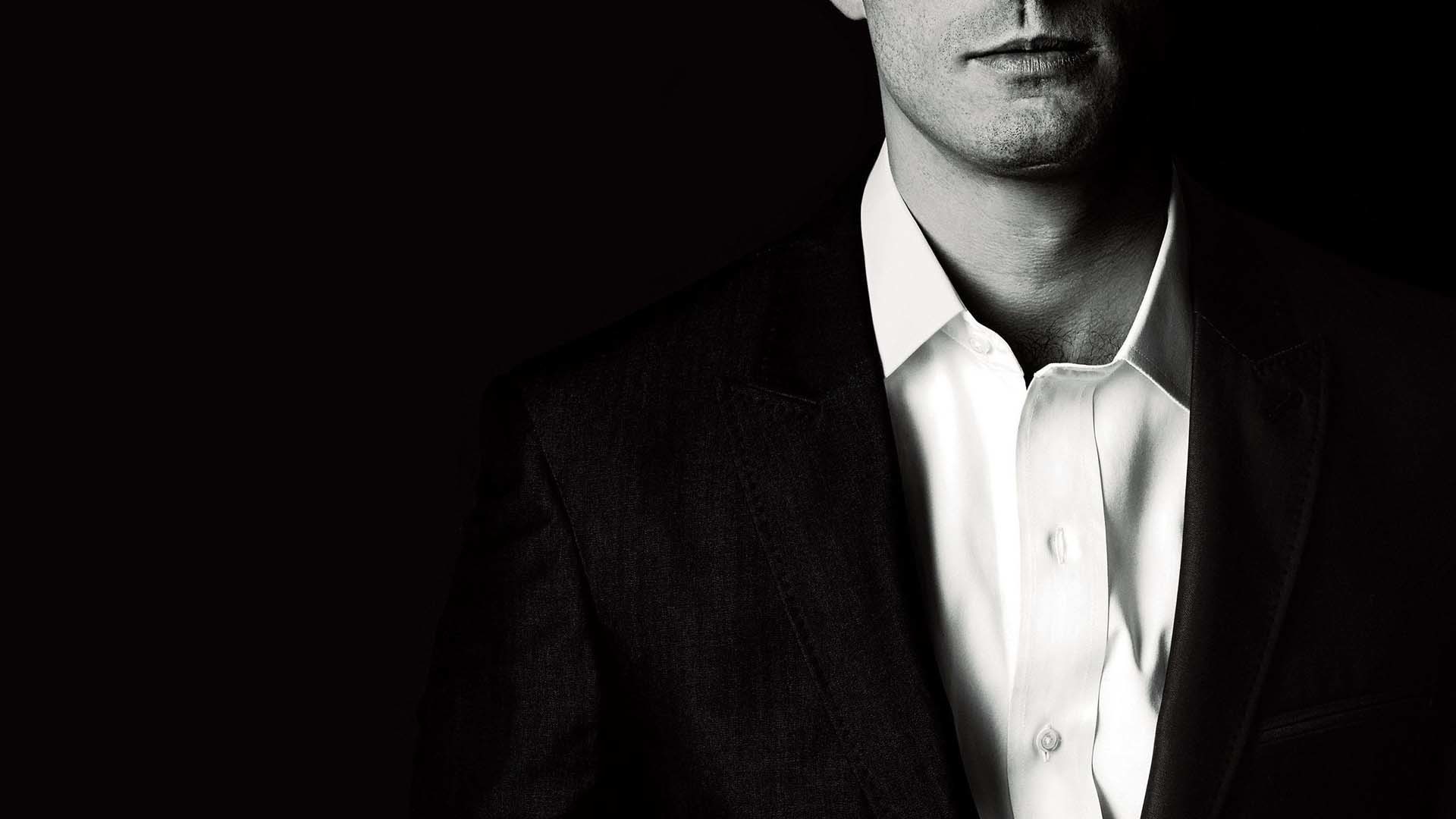 fifty shades darker wallpaper,suit,white,black,formal wear,chin