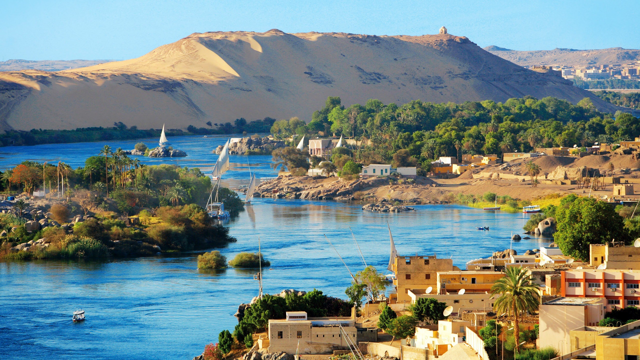 nile wallpaper,body of water,natural landscape,coast,tourism,town