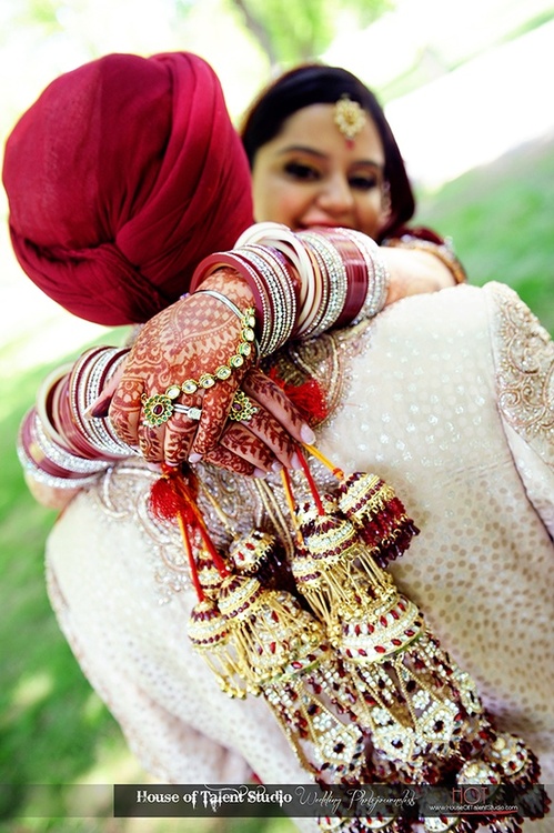 punjabi married couple wallpaper,tradition,sitting,grass,textile,photography