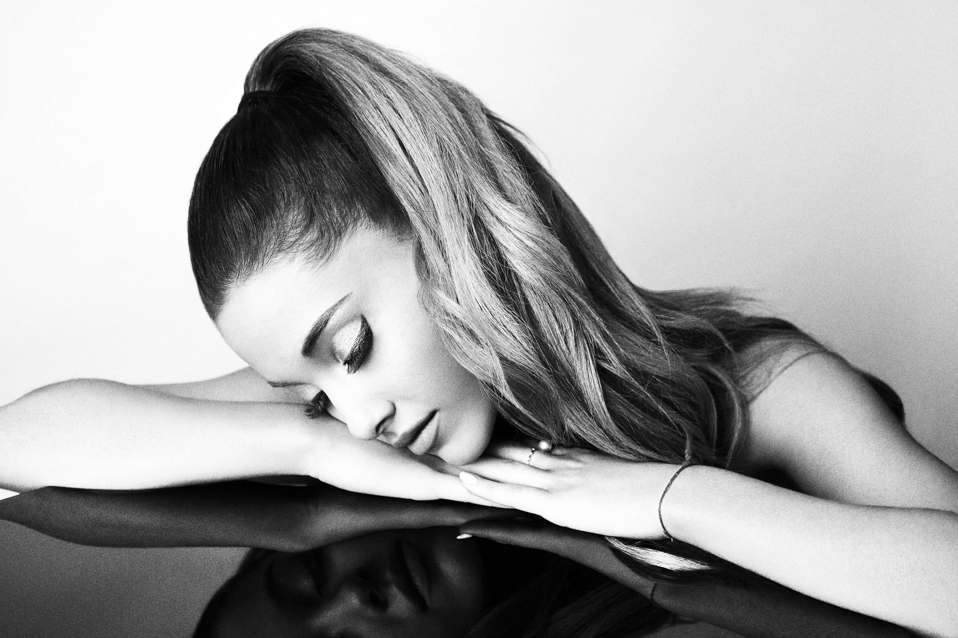 ariana grande wallpaper,hair,face,black,skin,black and white