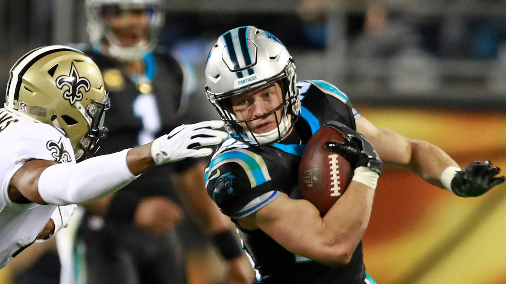 christian mccaffrey wallpaper,sportausrüstung,sport,helm,sportausrüstung,persönliche schutzausrüstung