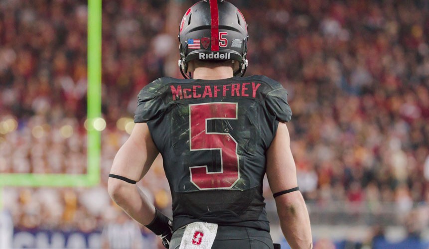 christian mccaffrey wallpaper,helmet,sports gear,american football,football gear,gridiron football