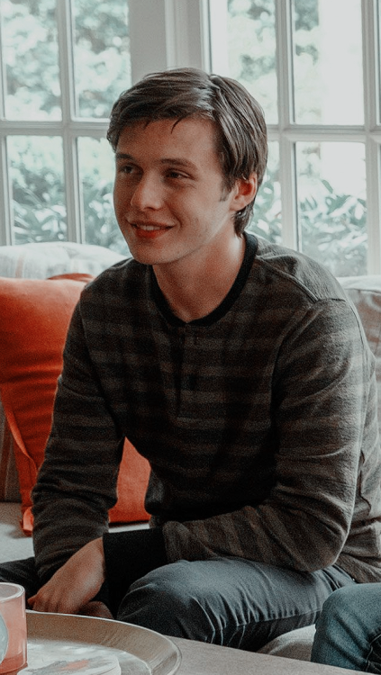 nick robinson wallpaper,sitting,smile