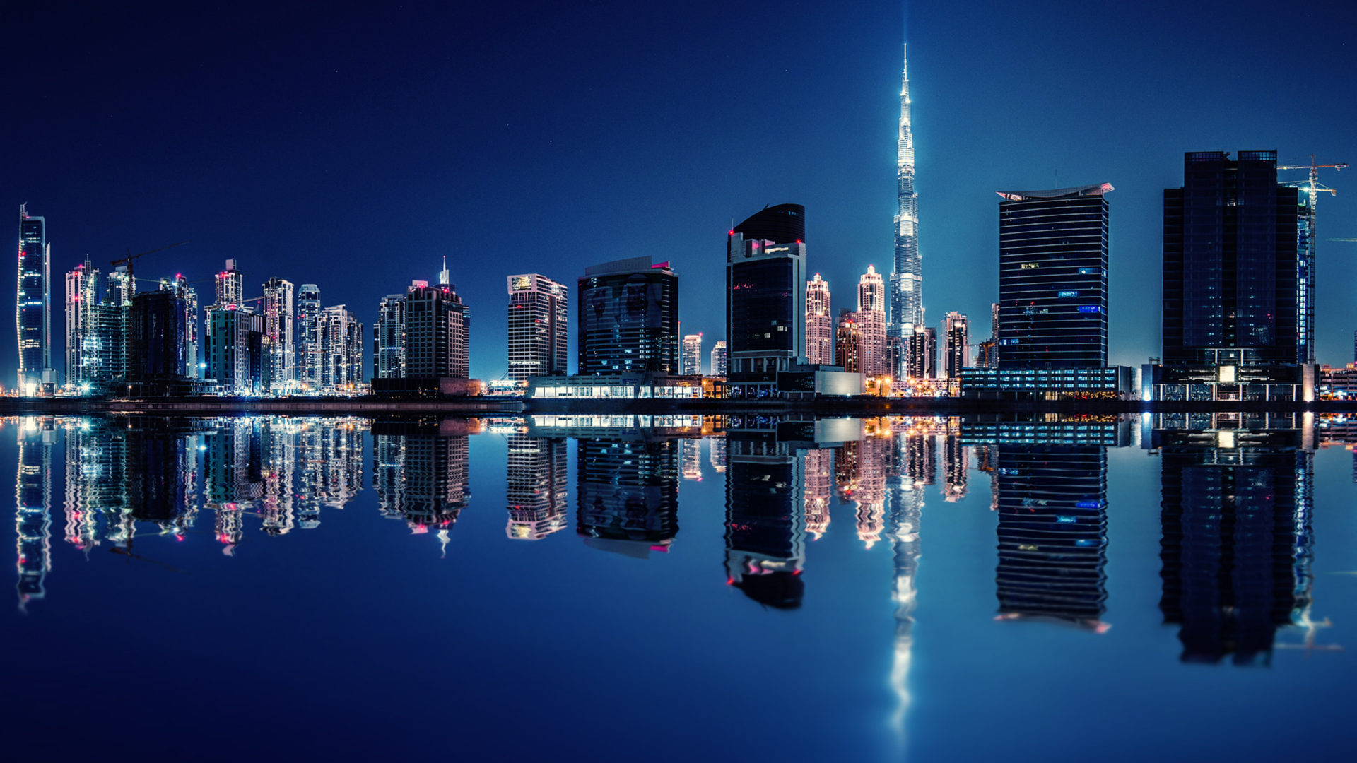 fond d'écran emirates hd,paysage urbain,ville,zone métropolitaine,réflexion,horizon