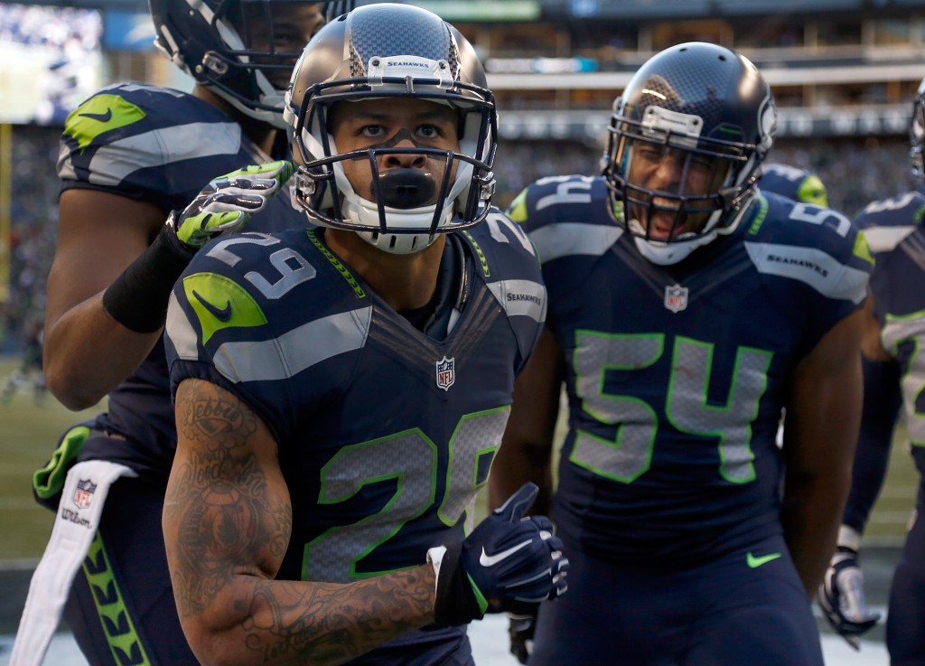 earl thomas wallpaper,sports gear,helmet,canadian football,football gear,team sport