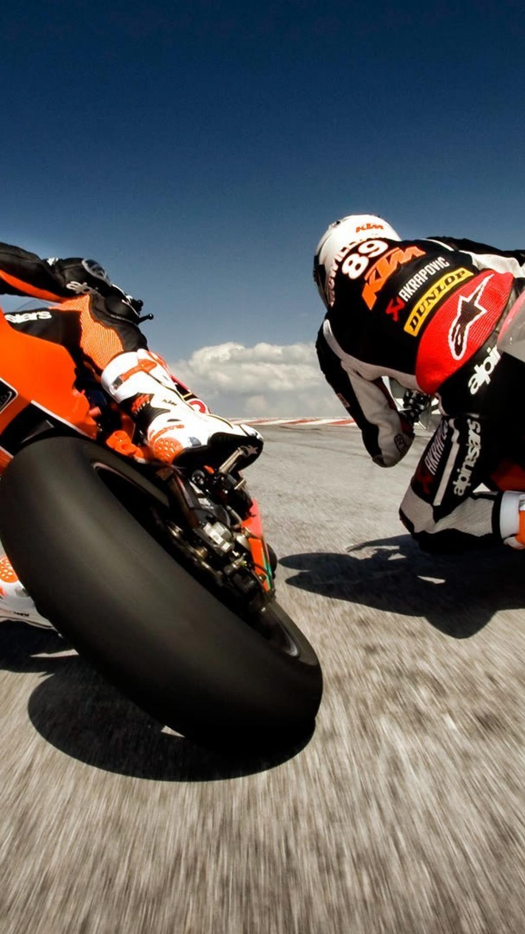 moto mobile wallpaper,grand prix motorcycle racing,motorcycle racer,superbike racing,motorcycle racing,motorsport