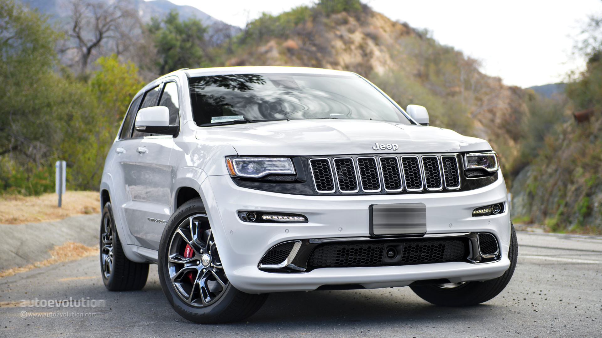 jeep grand cherokee wallpaper,land vehicle,vehicle,car,automotive tire,tire