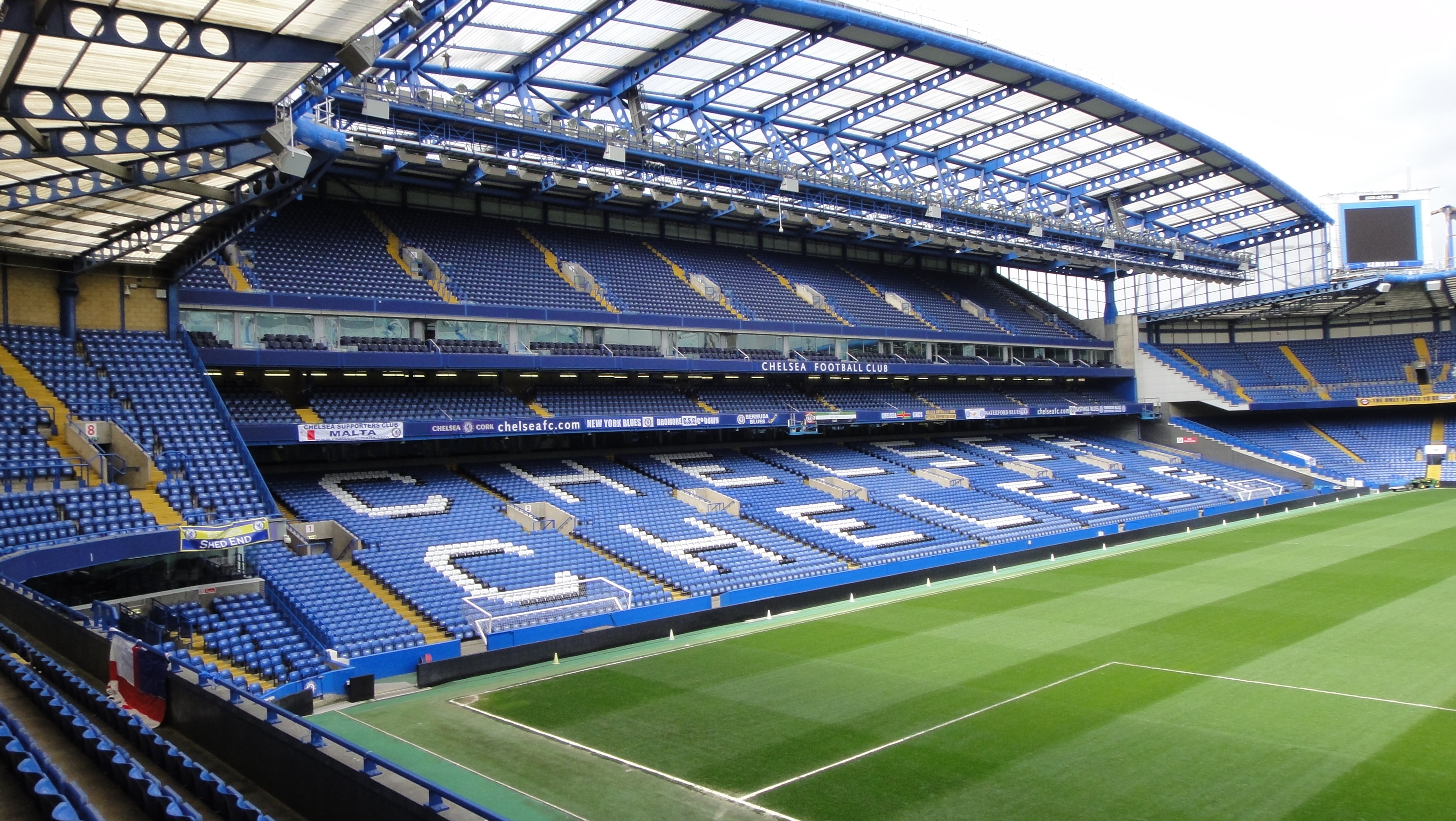 fond d'écran stamford bridge,stade,stade spécifique au football,gazon artificiel,herbe,zone urbaine