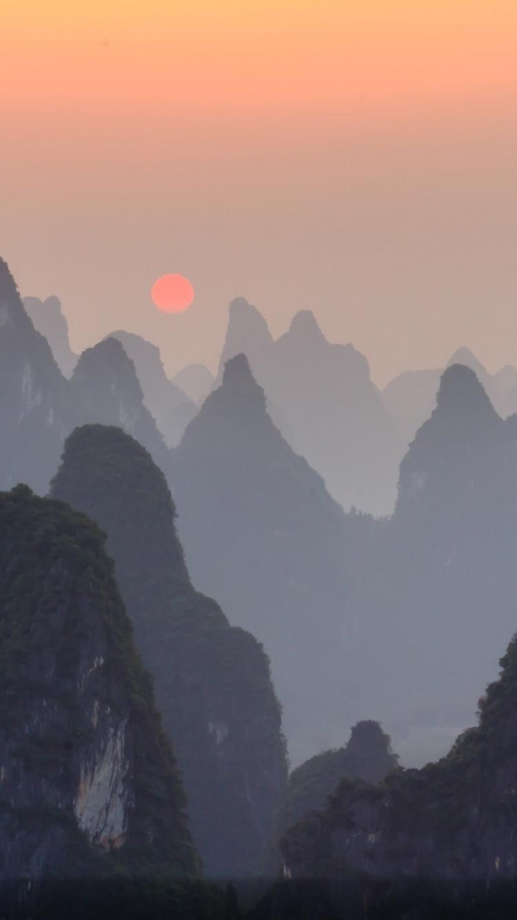 national geographic iphone wallpaper,mountainous landforms,sky,mountain,mountain range,atmospheric phenomenon