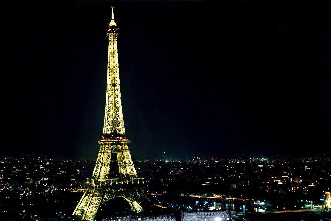 eiffel tower at night wallpaper,landmark,tower,night,metropolitan area,city