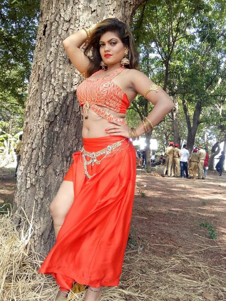 bhojpuri girl hd wallpaper,abdomen,navel,clothing,orange,photo shoot