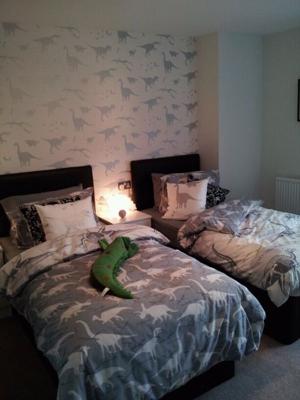 dinosaur wallpaper for bedroom,bedroom,bed,furniture,room,bed sheet