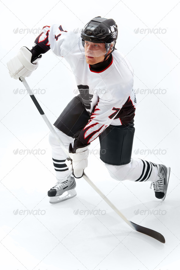 fond d'écran rondelle,hockey sur glace,joueur,jeux de bâton et de balle,le hockey,coup de swing solide