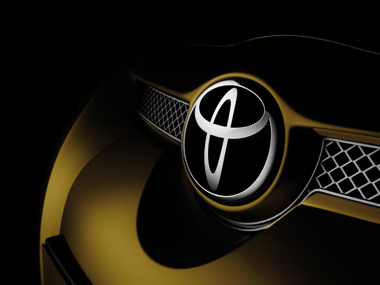 toyota logo wallpaper,gelb,fahrzeug,auto,schriftart,emblem