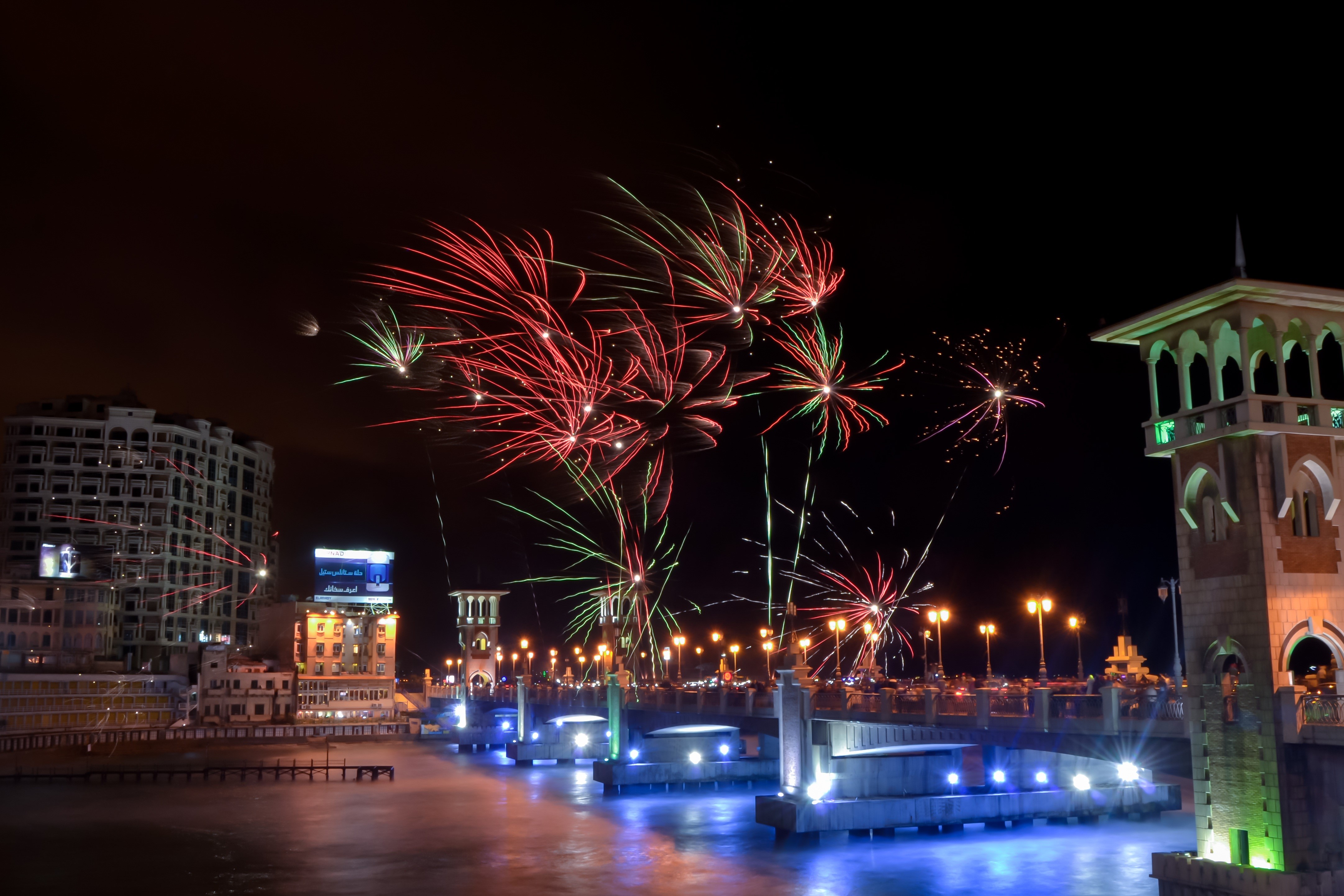 alexandria wallpaper,fireworks,night,landmark,lighting,new years day