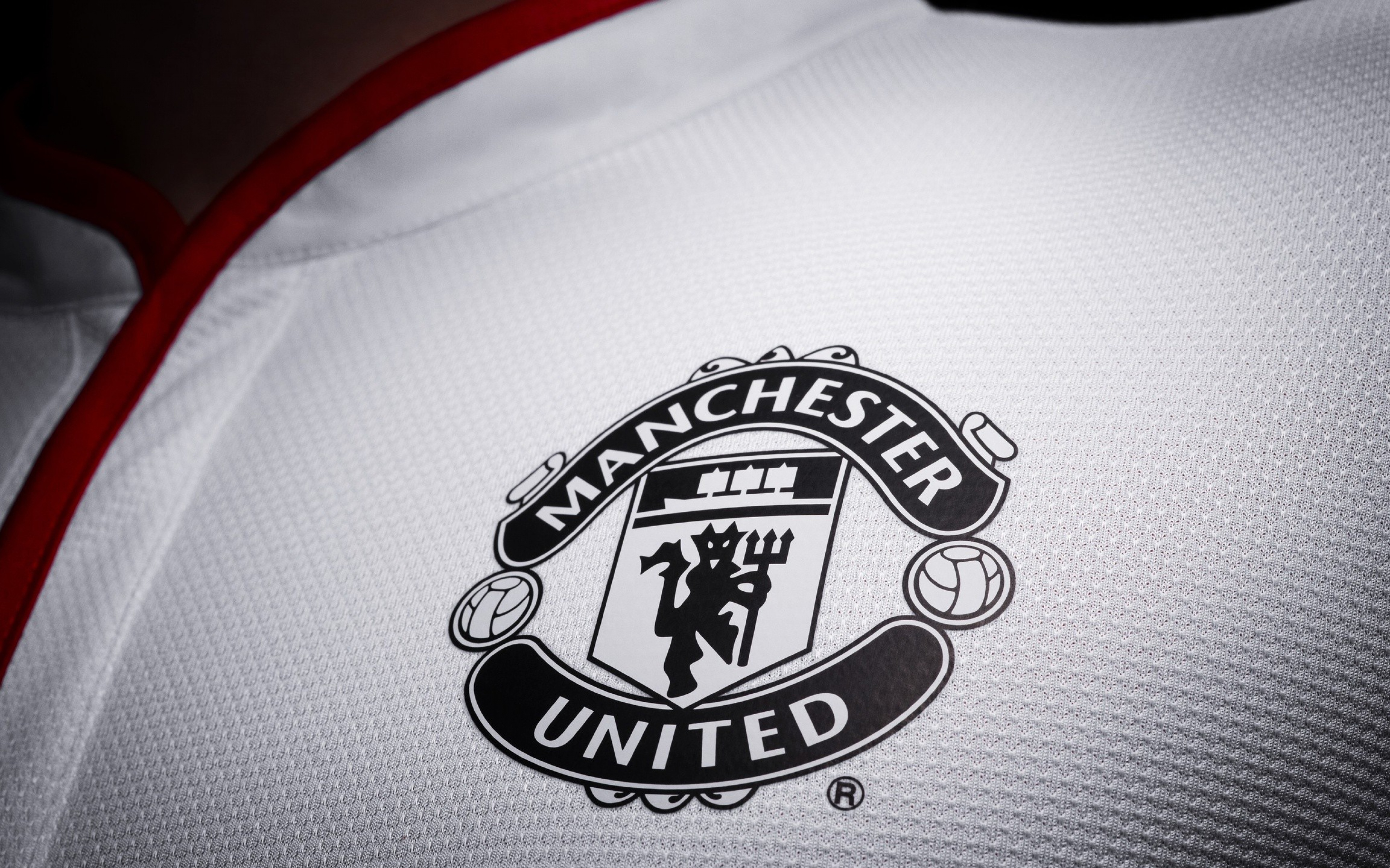 best manchester united wallpapers,helmet,logo,emblem,font,personal protective equipment