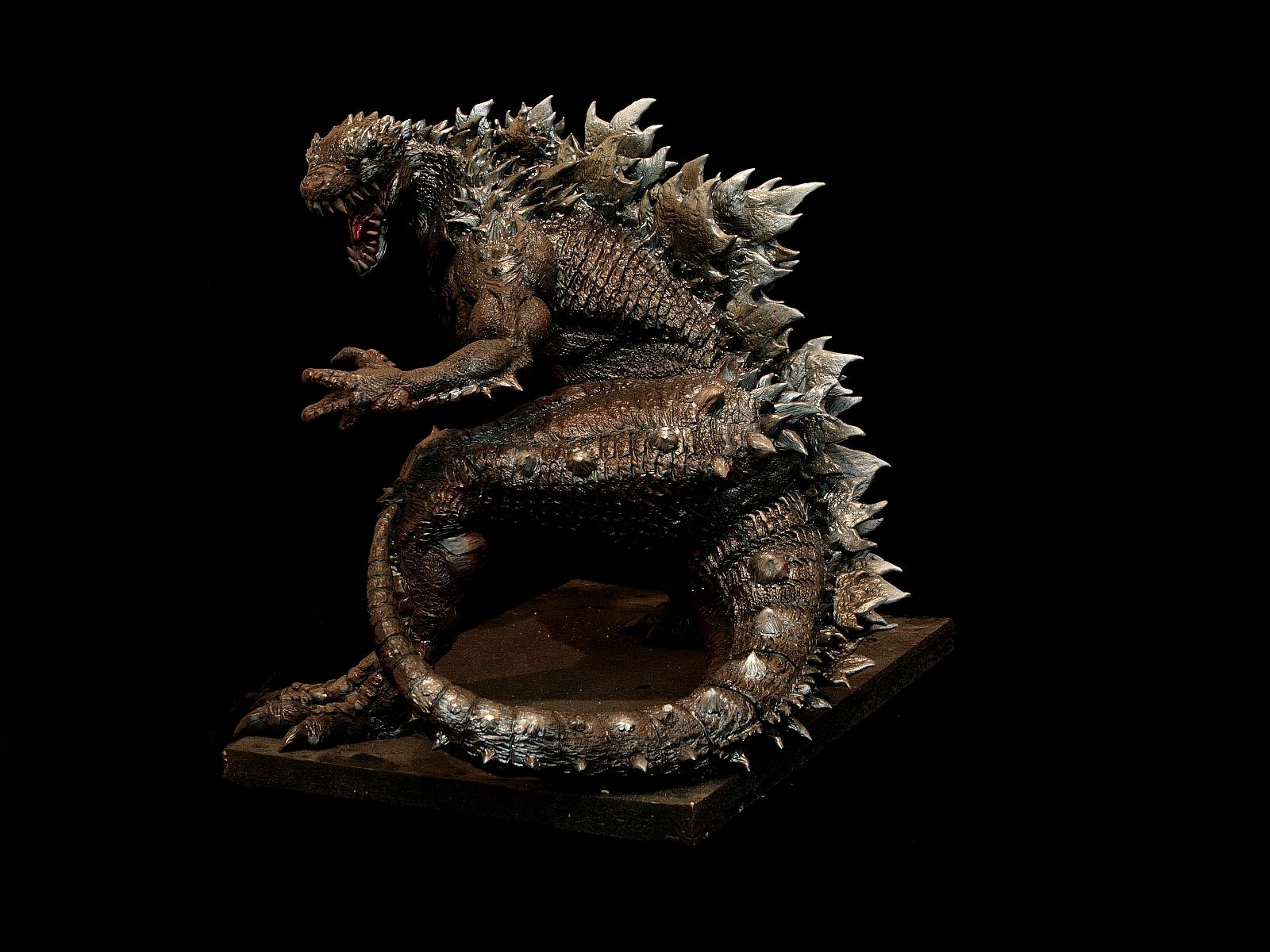 godzilla iphone wallpaper,sculpture,statue,figurine,metal,lizard