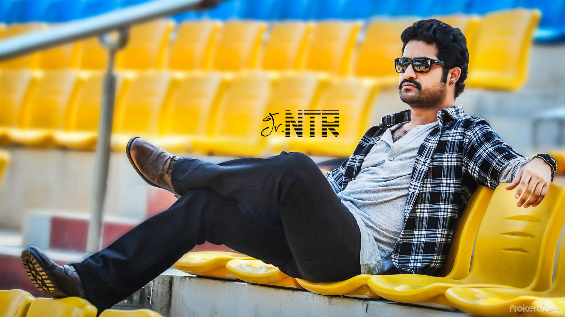 ntr wallpapers download,yellow,sitting,cool,fun,jeans