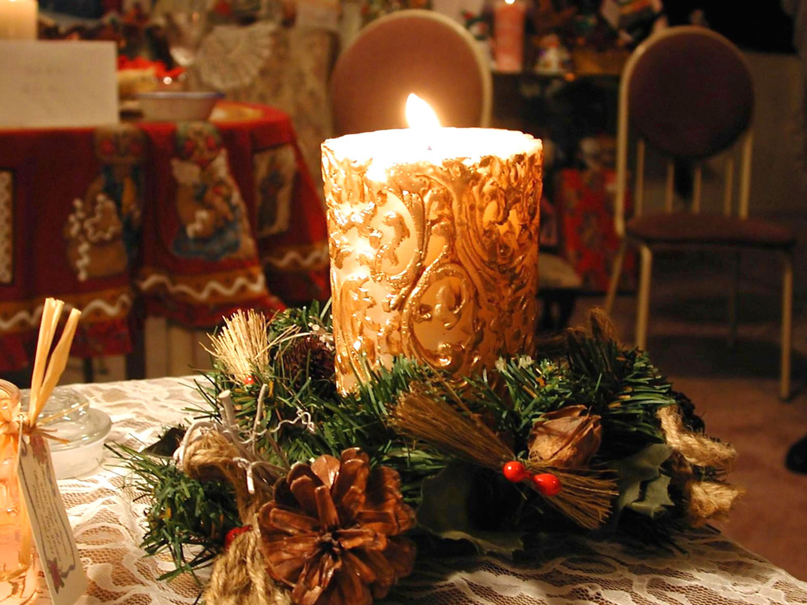 christmas candle wallpaper,candle,lighting,centrepiece,christmas,floral design