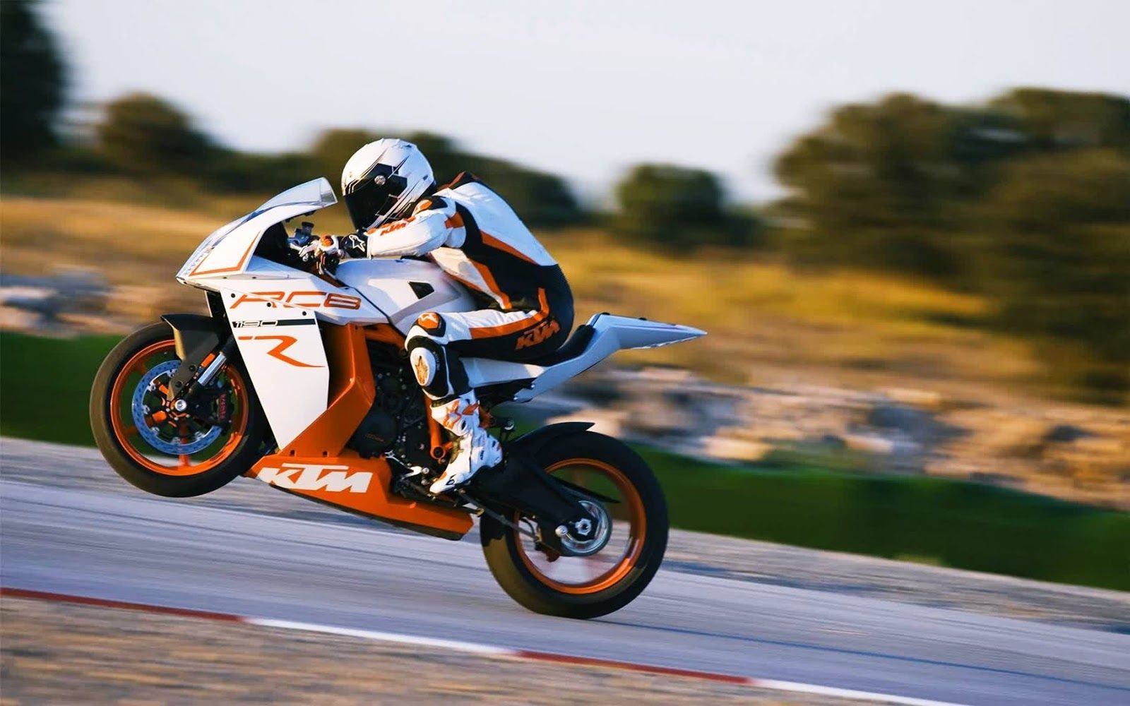 wallpaper motogp bergerak,land vehicle,motorcycle,vehicle,motorcycle racer,road racing
