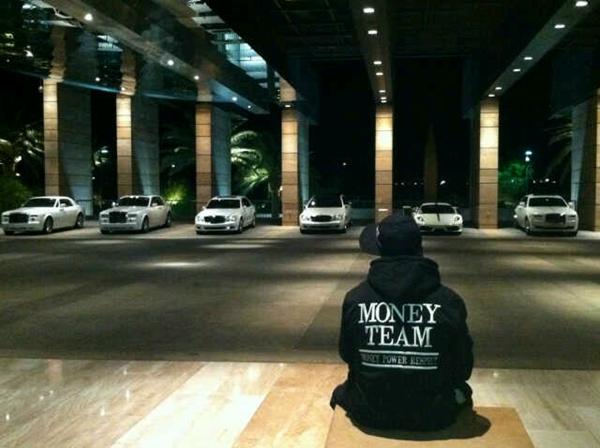 the money team wallpaper,luxury vehicle,mode of transport,vehicle,car,city