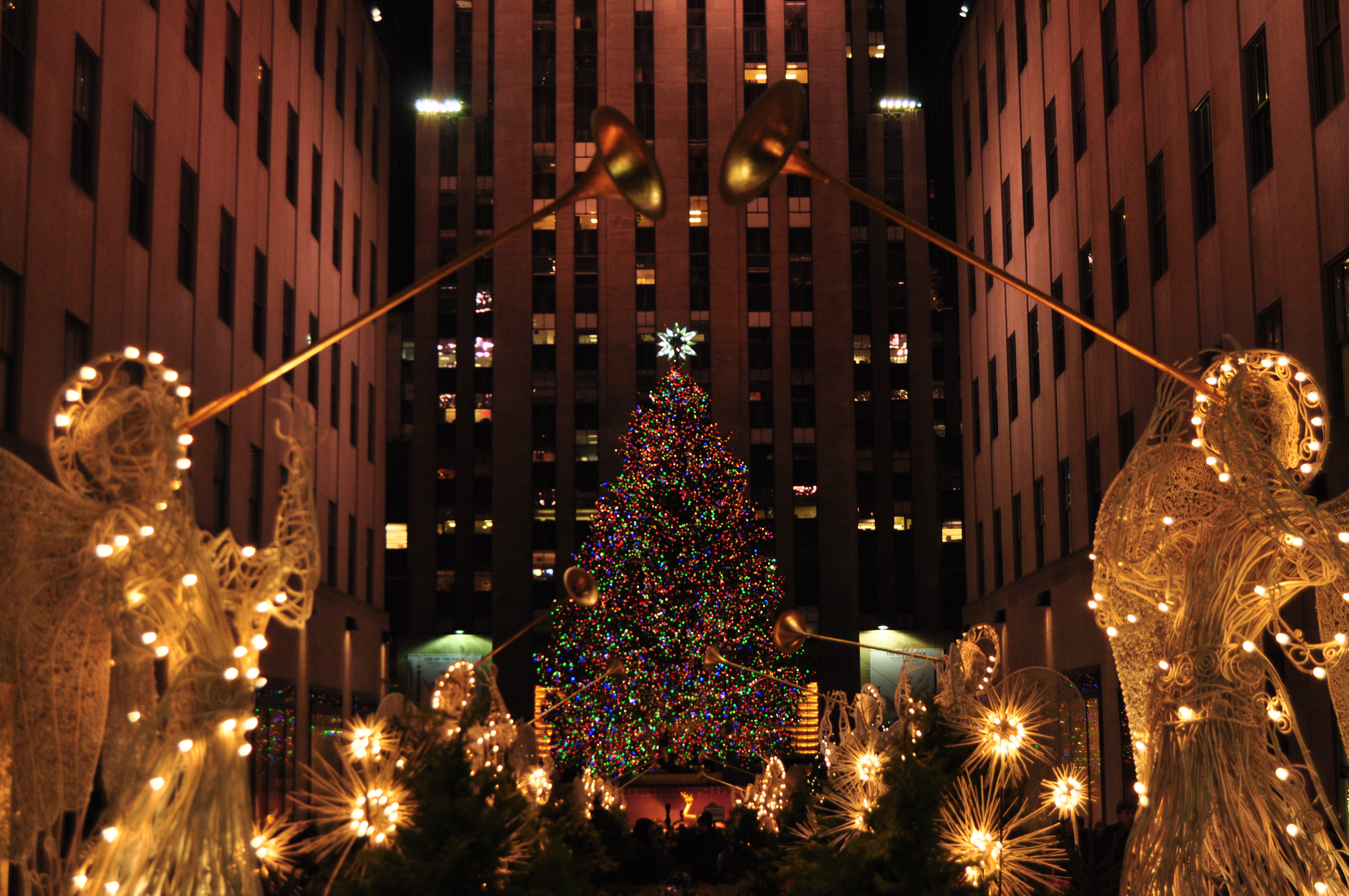 new christmas wallpaper,landmark,urban area,christmas tree,metropolitan area,metropolis