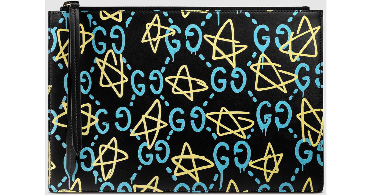 gucci ghost wallpaper,yellow,pattern,design,font,laptop bag