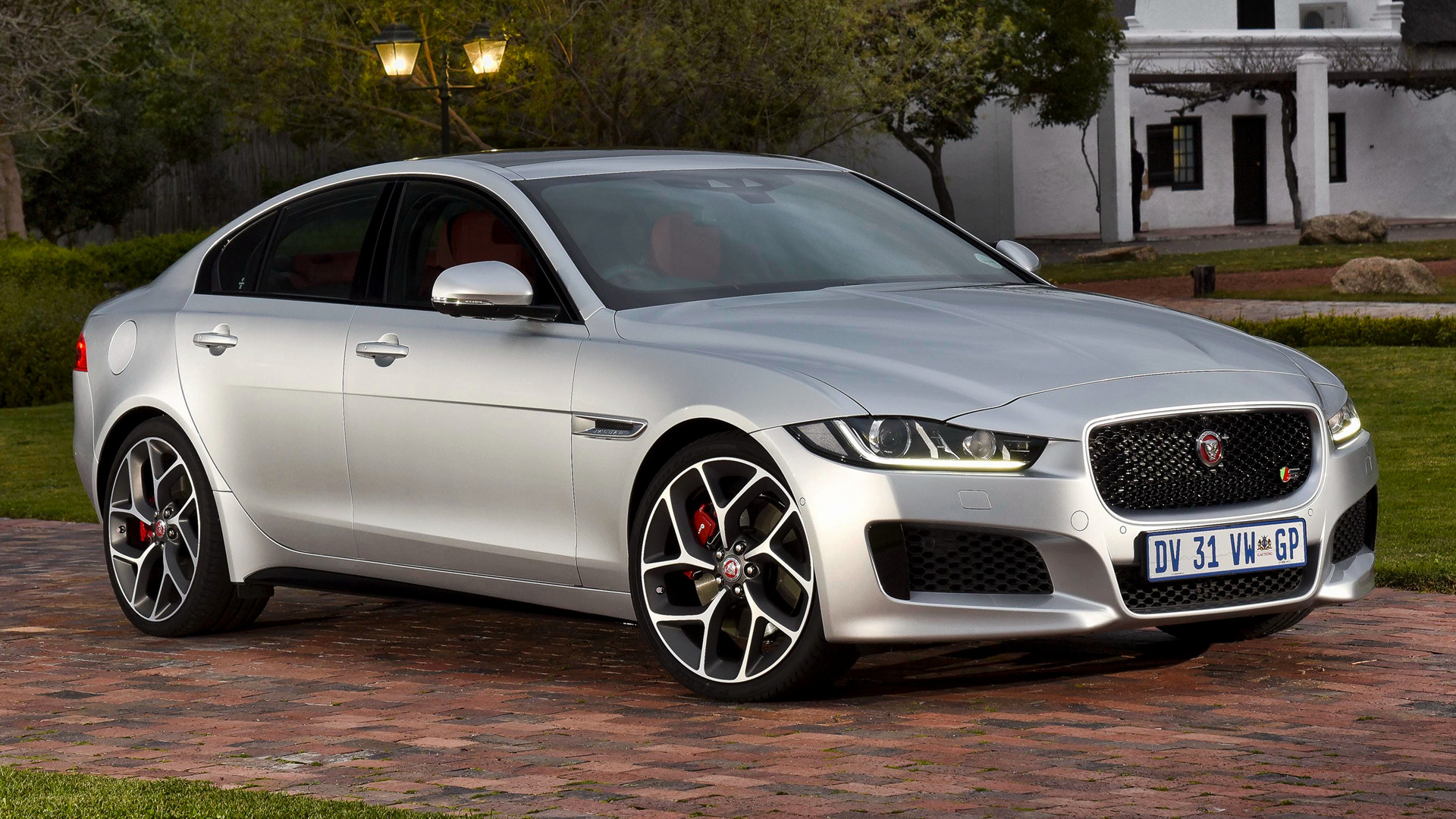 jaguar xe wallpaper,land vehicle,vehicle,luxury vehicle,car,automotive design