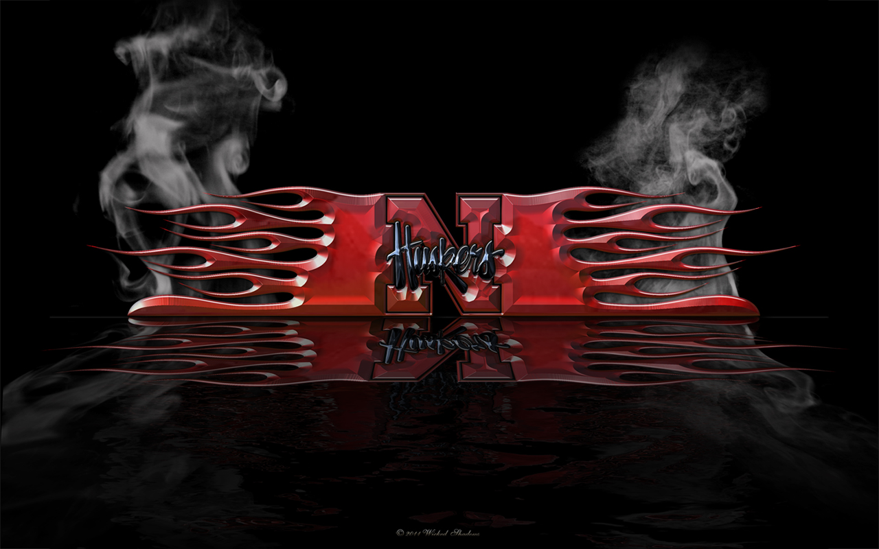 nebraska football wallpaper,red,black,text,darkness,font