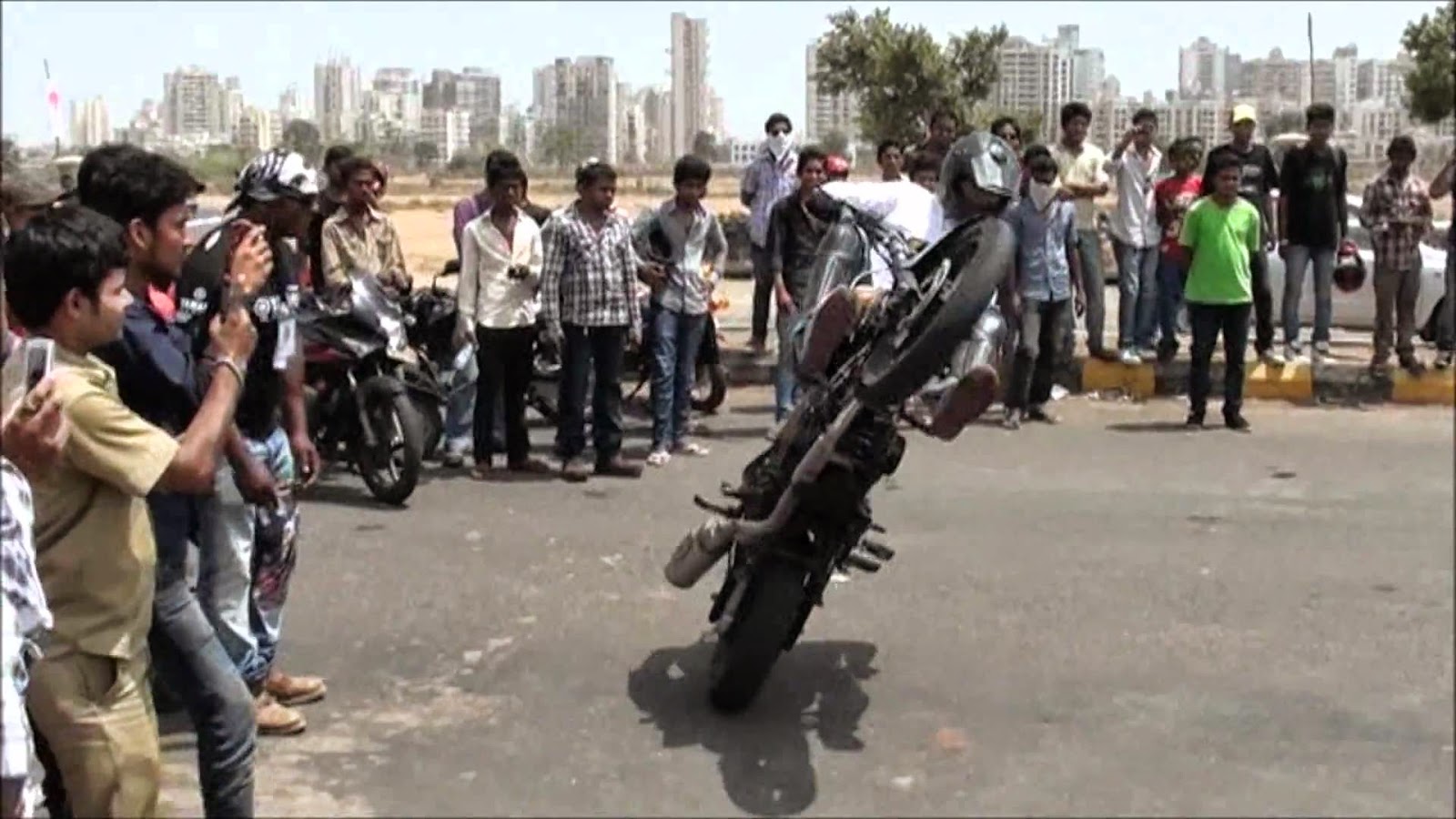 nokia 220 wallpaper,people,stunt performer,stunt,crowd,motorcycling