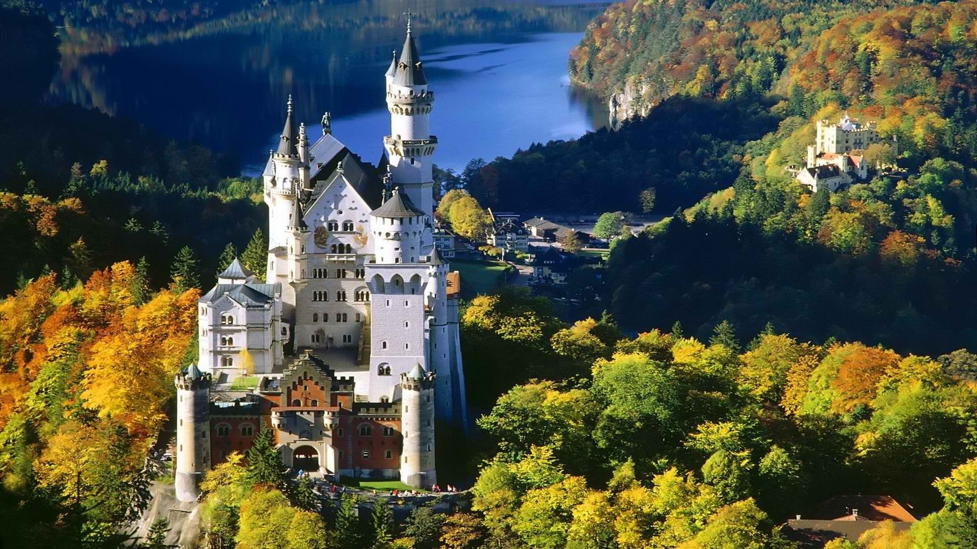 neuschwanstein castle wallpaper,natural landscape,nature,landmark,castle,mountain village