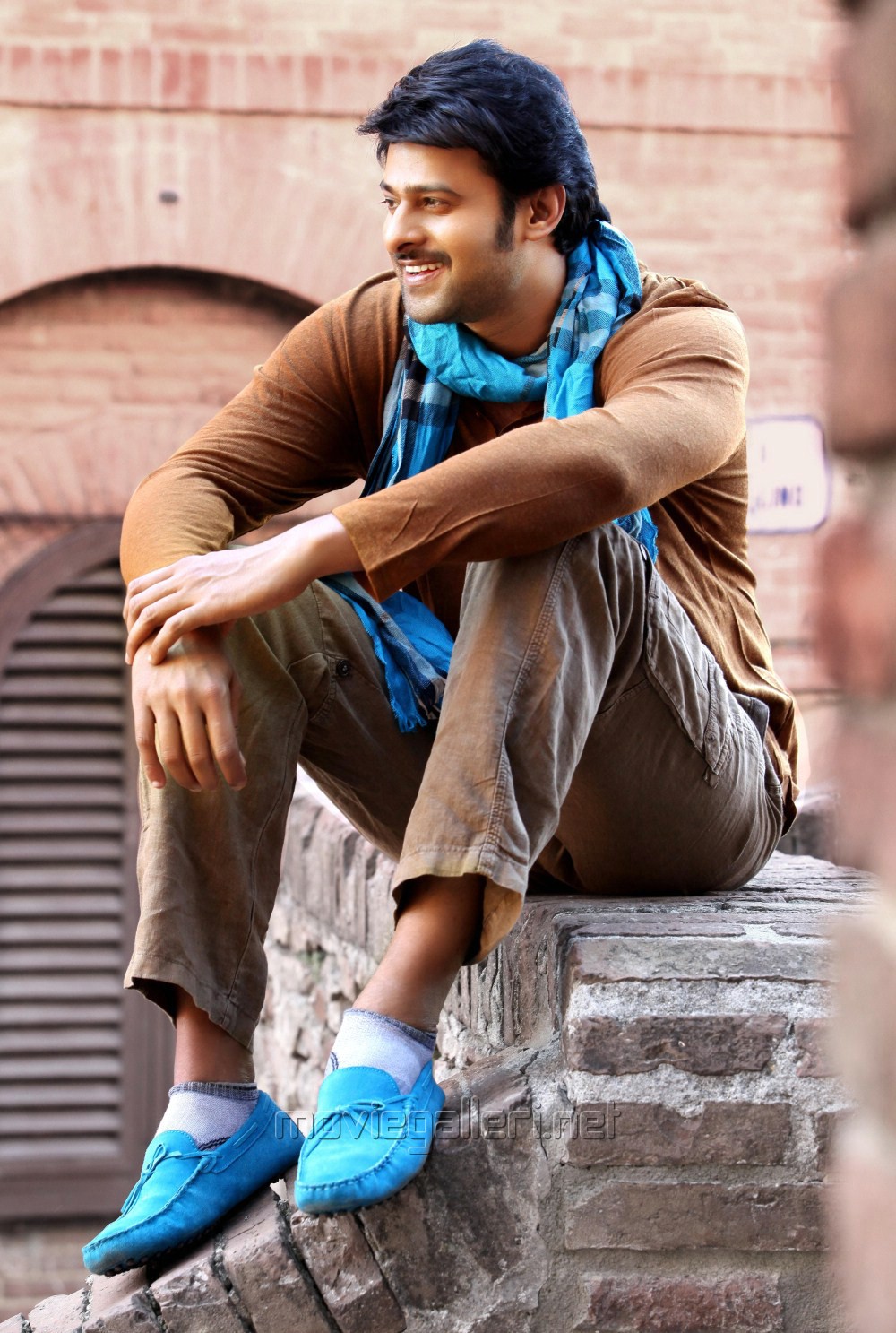 prabhas new wallpapers,sitting,turquoise,cool,footwear,leg