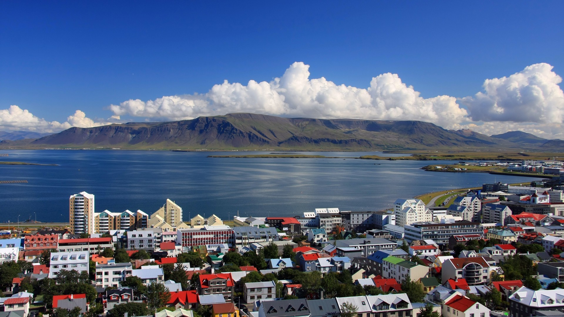 reykjavik wallpaper,sky,town,mountain,mountainous landforms,natural landscape