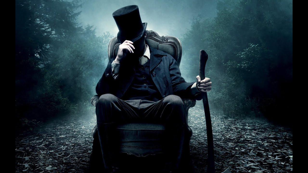 abraham lincoln wallpaper,darkness,sitting,photography,outerwear,movie