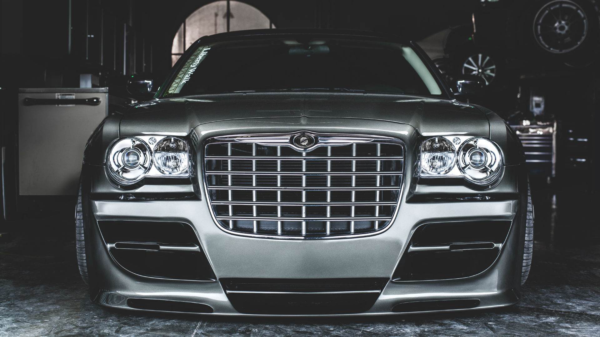 chrysler wallpaper,land vehicle,vehicle,car,grille,luxury vehicle