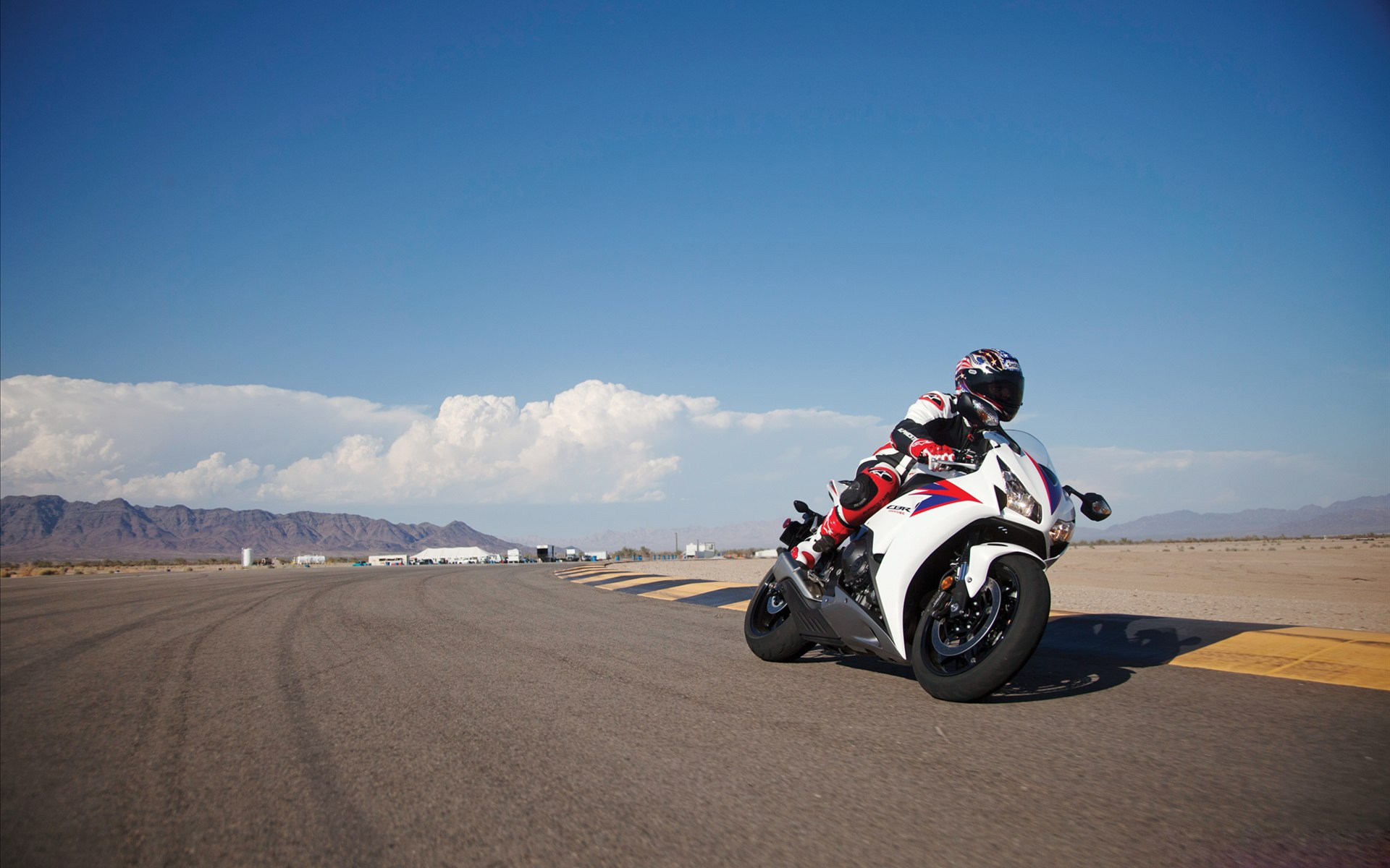 honda motorcycle wallpaper,motorcycle,motorcycle racer,motorcycling,vehicle,superbike racing
