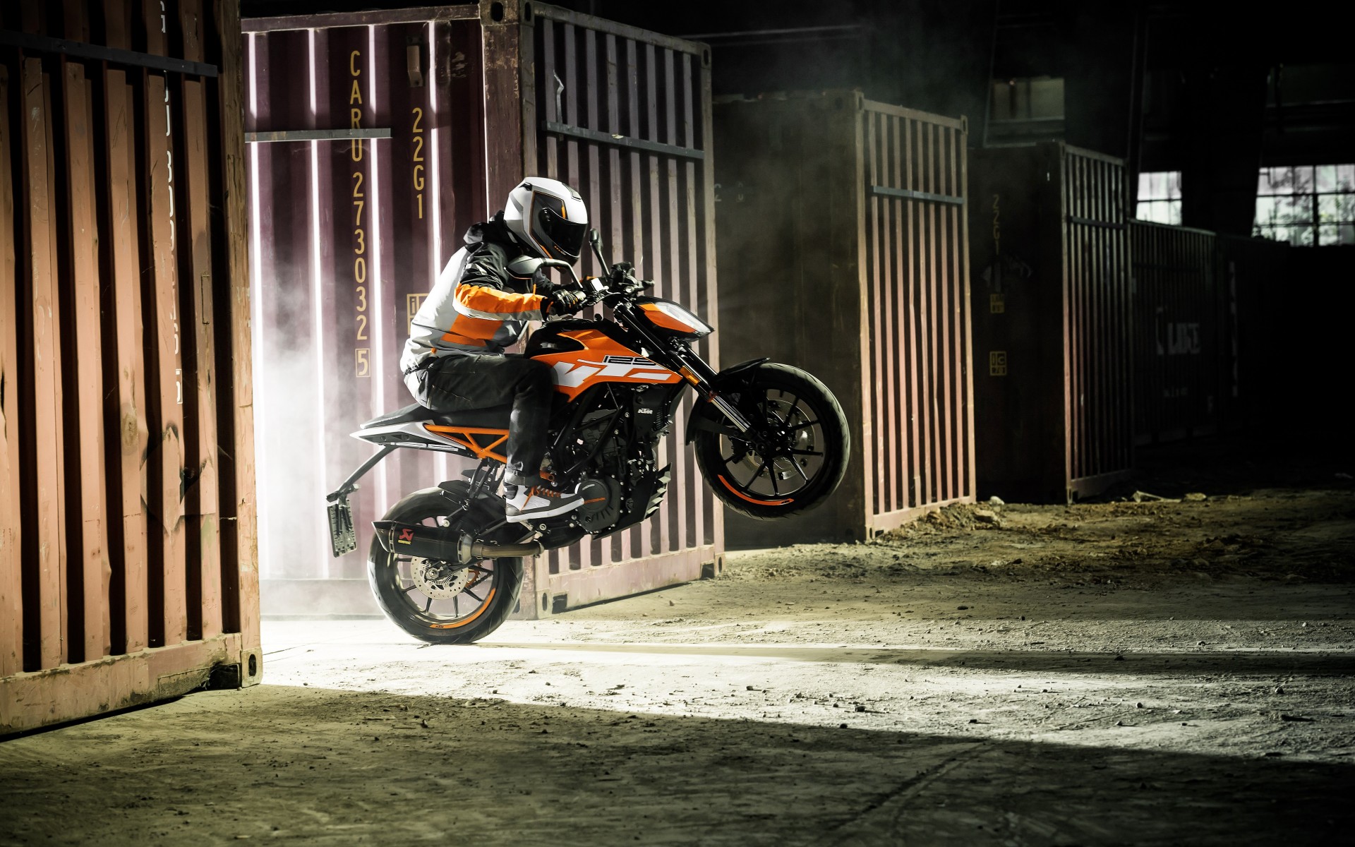 ktm duke 125 wallpaper,land vehicle,motorcycle,vehicle,motorcycling,stunt performer