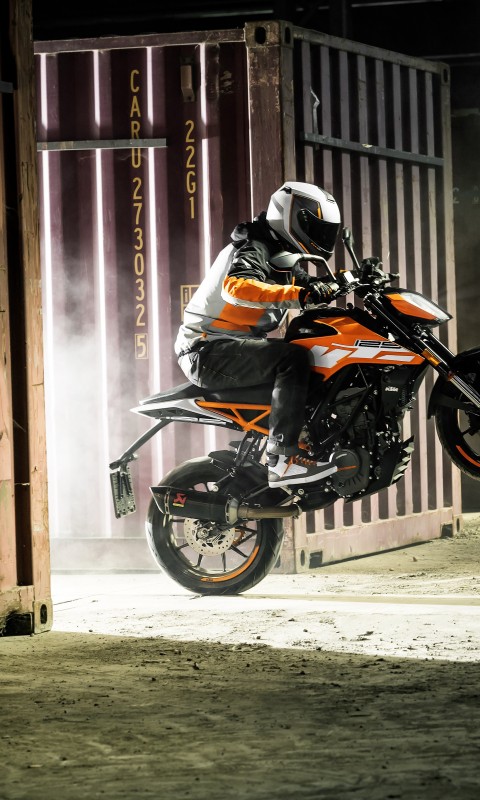 ktm duke 125 wallpaper,motorcycle,vehicle,supermoto,motorcycle racer,motorcycle racing