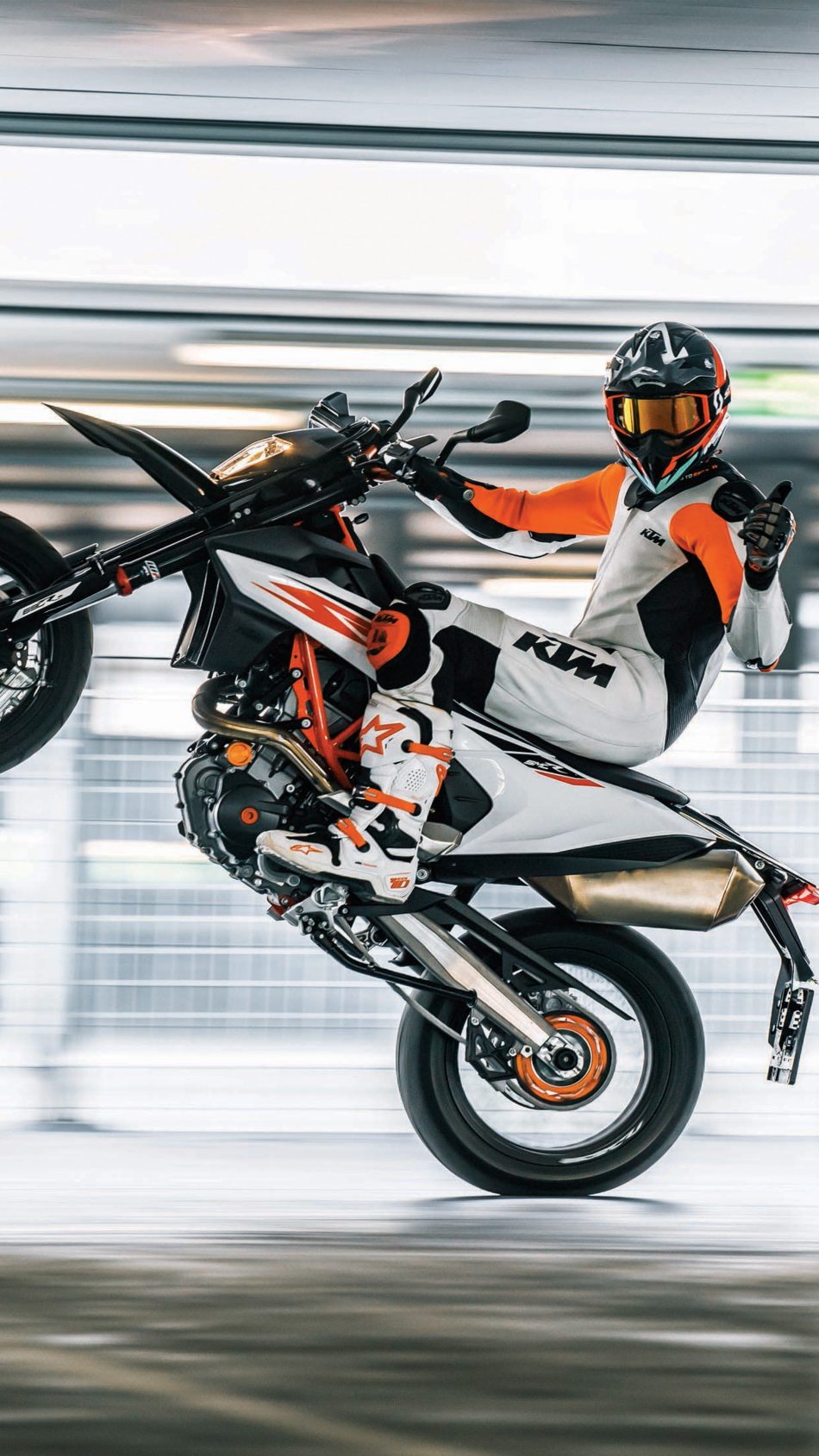 ktm wallpaper for mobile,motorcycle racer,supermoto,motorcycle,vehicle,stunt performer